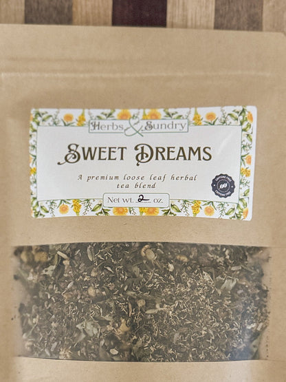 Sweet Dreams kraft pouch and floral label photographed against a striped wooden board